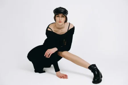 "Bold in Black: Redefining Elegance and Empowerment" — BLOOM Magazine, April 2025