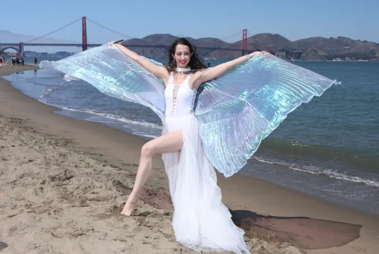 White Angel on the Golden Beach — BLOOM Magazine, October 2025